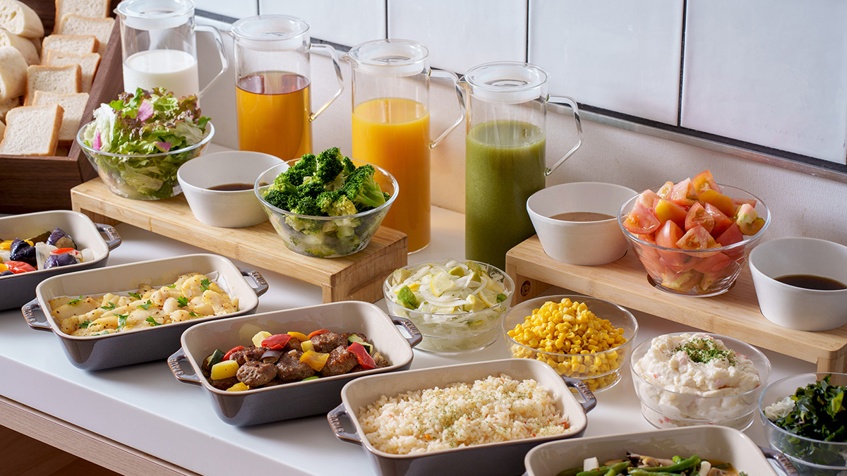 Spread of buffet dishes and desserts