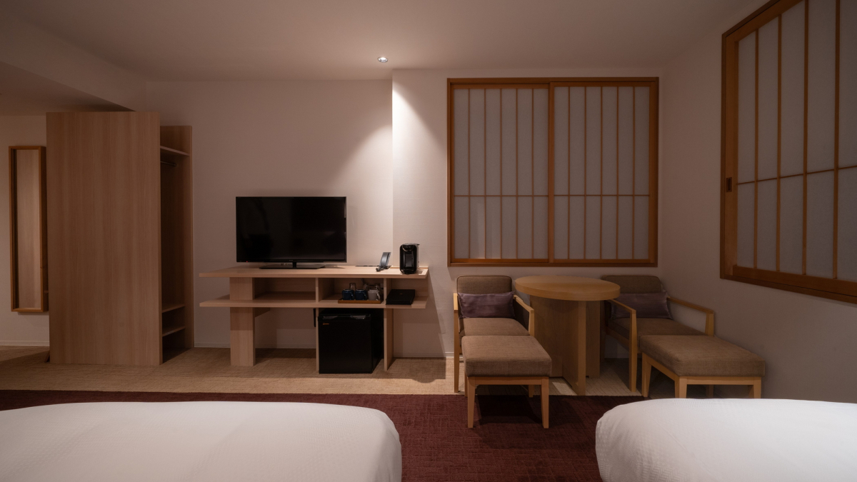 Interior view of deluxe twin room at night