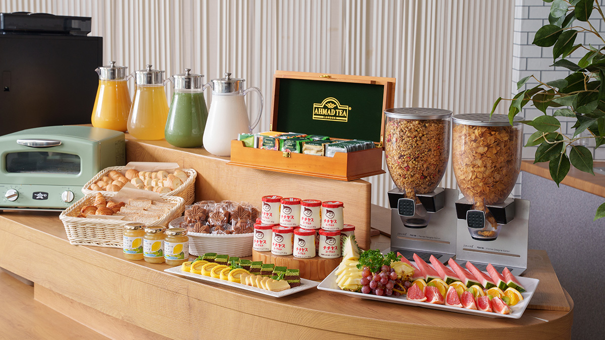 A counter with desserts and drinks