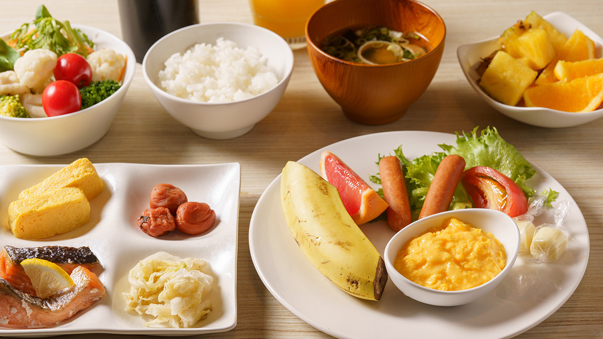 Continental plate with rice, miso soup, side dishes, and salad from the buffet