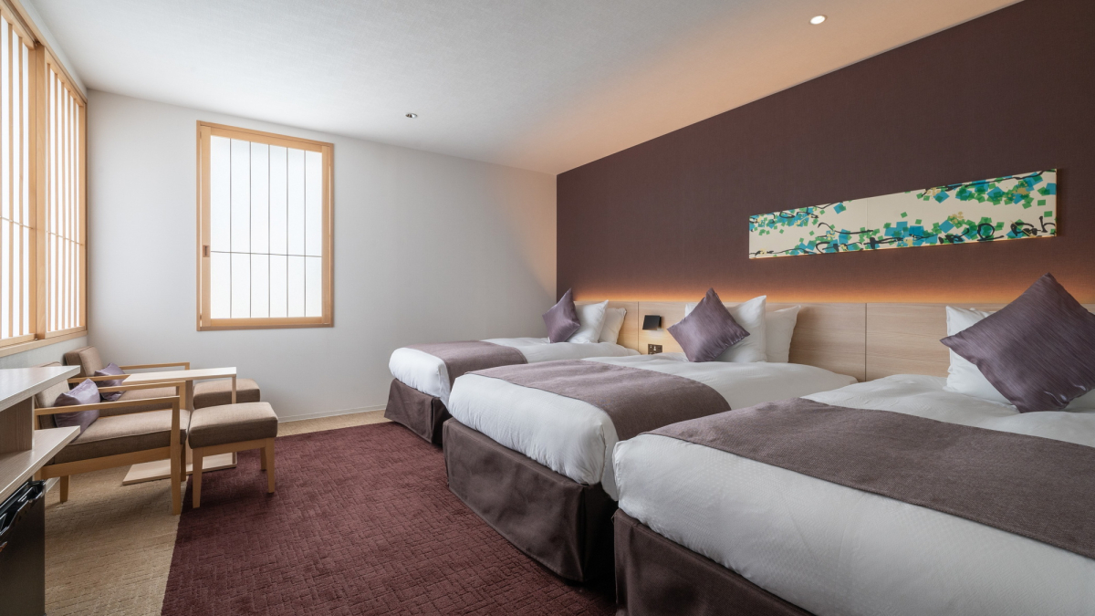 Interior view of deluxe twin room, triple room specification