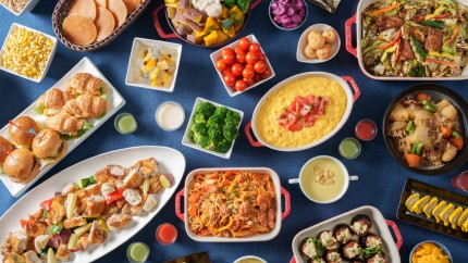 A buffet featuring a variety of Japanese, Western, and Chinese dishes