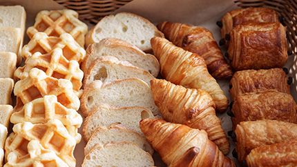 A Display of Waffles, Croissants, and Other Baked Items