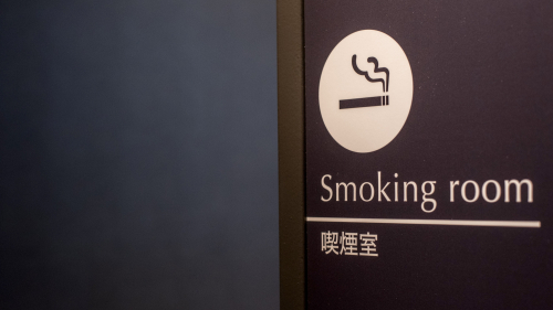 Photo of pictogrammed wall in smoking room